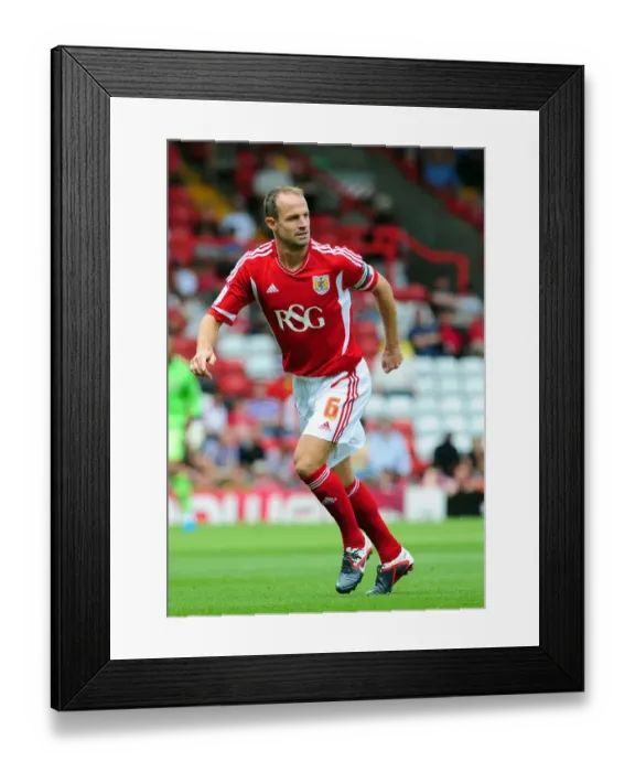 Framed Print : Bristol City Captain Louis Carey Leads the Charge Against West Brom in Championship Clash at Ashton Gate, 2011 Framed Print : Bristol City Captain Louis Carey Leads the Charge Against West Brom in Championship Clash at Ashton Gate, 2011