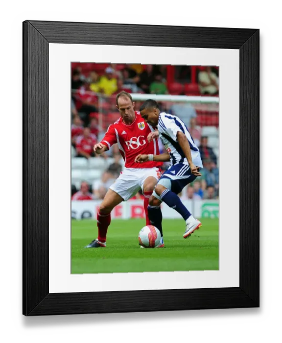 Framed Print : Bristol City vs. West Brom: A Battle for the Ball - Louis Carey vs. Jerome Thomas, Championship Match, 2011 Framed Print : Bristol City vs. West Brom: A Battle for the Ball - Louis Carey vs. Jerome Thomas, Championship Match, 2011