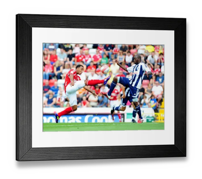 Framed Print : Bristol City vs. West Brom: Intense Battle Between Nicky Maynard and Youssouf Mulumbu in Championship Match, 2011
