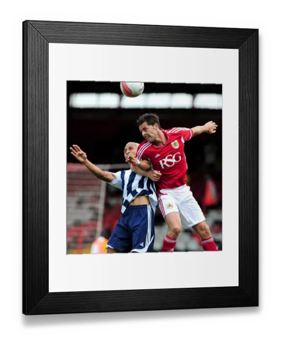 Framed Print : Battling for Supremacy: McAllister vs. Odemwingie in the Championship Clash between Bristol City and West Brom (30 / 07 / 2011) Framed Print : Battling for Supremacy: McAllister vs. Odemwingie in the Championship Clash between Bristol City and West Brom (30 / 07 / 2011)