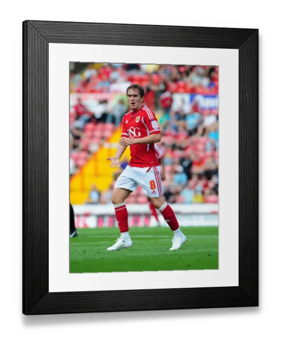 Framed Print : Neil Kilkenny Faces Off Against West Brom in Intense Championship Clash at Ashton Gate, 2011 Framed Print : Neil Kilkenny Faces Off Against West Brom in Intense Championship Clash at Ashton Gate, 2011