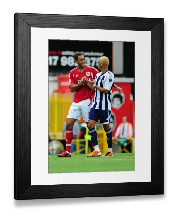 Framed Print : Bristol City vs. West Brom: A Light-Hearted Moment Between Lewin Nyatanga and Peter Odemwingie (Championship Football Match, 30th July 2011, Ashton Gate Stadium) Framed Print : Bristol City vs. West Brom: A Light-Hearted Moment Between Lewin Nyatanga and Peter Odemwingie (Championship Football Match, 30th July 2011, Ashton Gate Stadium)