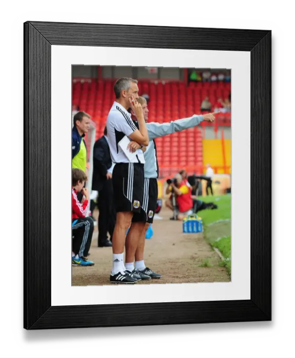 Framed Print : Bristol City FC: Keith Milen Leads the Charge Against West Brom, Championship Clash at Ashton Gate Stadium (30 / 07 / 2011)