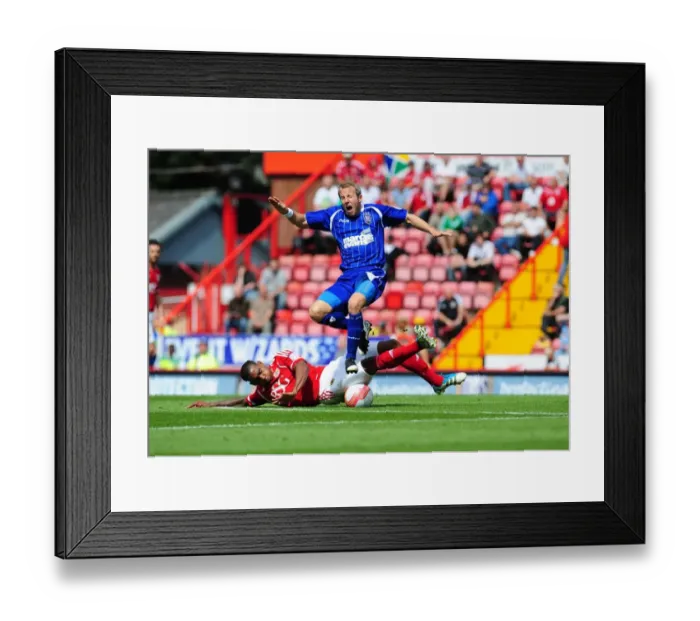 Framed Print : Bristol City vs Ipswich Town: Marvin Elliott Tackles Lee Bowyer - Championship Clash at Ashton Gate, 2011