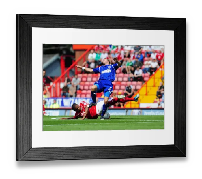 Framed Print : Marvin Elliott vs Lee Bowyer: Intense Championship Showdown at Ashton Gate, 2011 Framed Print : Marvin Elliott vs Lee Bowyer: Intense Championship Showdown at Ashton Gate, 2011