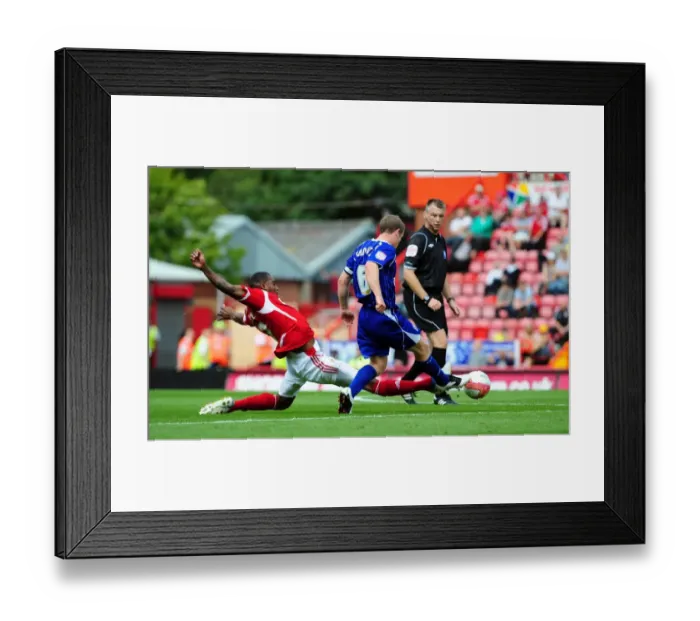 Framed Print : Marvin Elliott vs Grant Leadbitter: Intense Championship Battle at Ashton Gate Stadium (06 / 08 / 2011) Framed Print : Marvin Elliott vs Grant Leadbitter: Intense Championship Battle at Ashton Gate Stadium (06 / 08 / 2011)