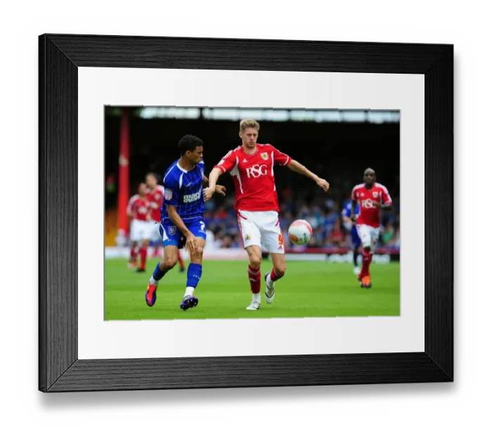 Framed Print : Bristol City vs Ipswich Town: Jon Stead vs Carlos Edwards Battle for Ball in Championship Match, August 2011 (Ashton Gate Stadium) Framed Print : Bristol City vs Ipswich Town: Jon Stead vs Carlos Edwards Battle for Ball in Championship Match, August 2011 (Ashton Gate Stadium)