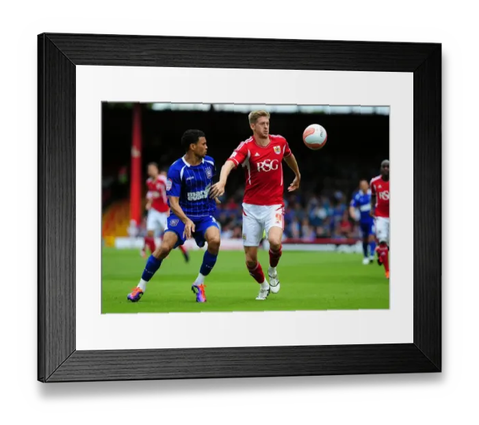 Framed Print : Bristol City vs Ipswich Town: A Championship Showdown - Jon Stead vs Carlos Edwards Intense Battle for Possession, August 2011 Framed Print : Bristol City vs Ipswich Town: A Championship Showdown - Jon Stead vs Carlos Edwards Intense Battle for Possession, August 2011