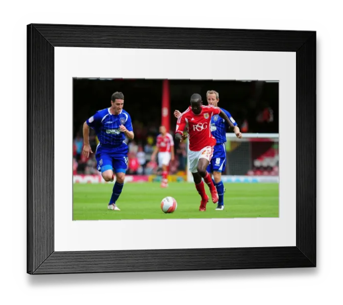 Framed Print : Adomah Outmaneuvers Kennedy: A Pivotal Moment in the 2011 Championship Clash Between Bristol City and Ipswich Town Framed Print : Adomah Outmaneuvers Kennedy: A Pivotal Moment in the 2011 Championship Clash Between Bristol City and Ipswich Town