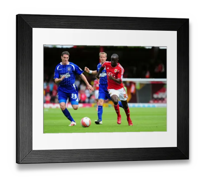 Framed Print : Adomah's Agile Maneuver: A Turning Point in the 2011 Championship Battle between Bristol City and Ipswich Town (Albert Adomah outsmarts Mark Kennedy) Framed Print : Adomah's Agile Maneuver: A Turning Point in the 2011 Championship Battle between Bristol City and Ipswich Town (Albert Adomah outsmarts Mark Kennedy)