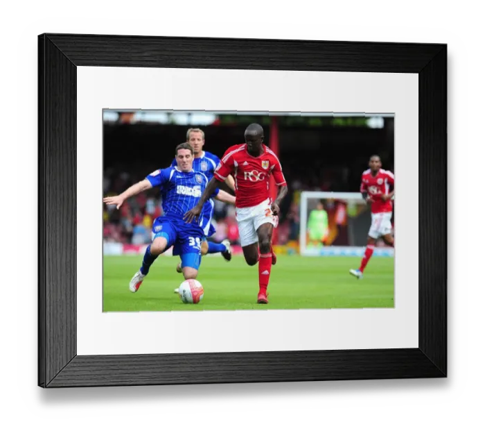 Framed Print : Adomah Outwits Kennedy: The Decisive Duel in the 2011 Championship Showdown between Bristol City and Ipswich Town