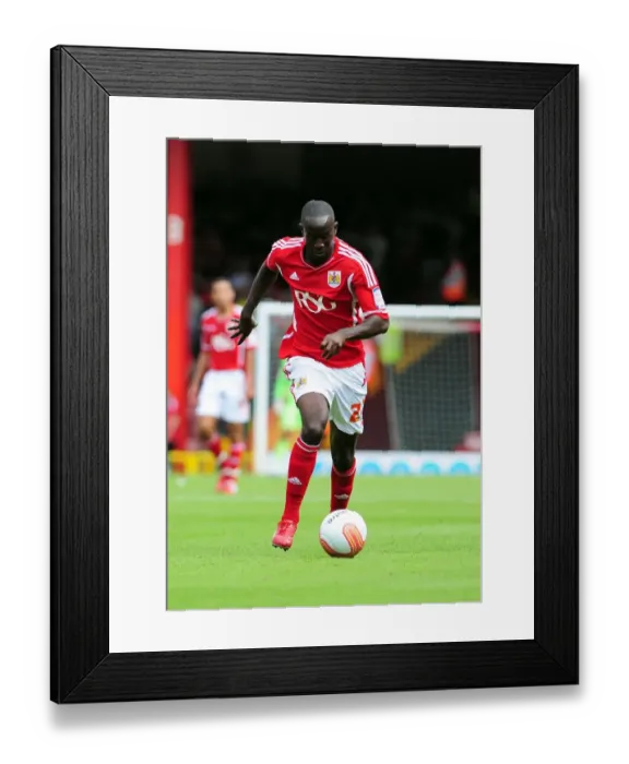 Framed Print : Adomah's Unyielding Spirit: Championship Showdown between Bristol City and Ipswich Town at Ashton Gate, 2011 Framed Print : Adomah's Unyielding Spirit: Championship Showdown between Bristol City and Ipswich Town at Ashton Gate, 2011