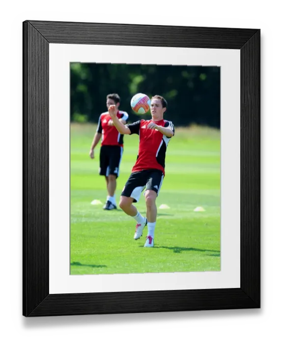 Framed Print : Neil Kilkenny: Bracing for Bristol City's Pre-Season Training Framed Print : Neil Kilkenny: Bracing for Bristol City's Pre-Season Training