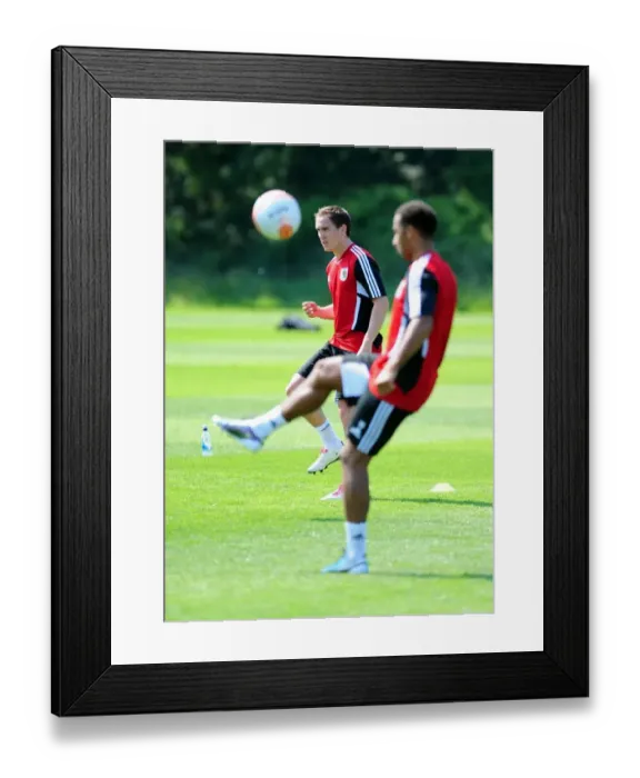 Framed Print : Neil Kilkenny: Unwavering Concentration During Bristol City's Pre-Season Training