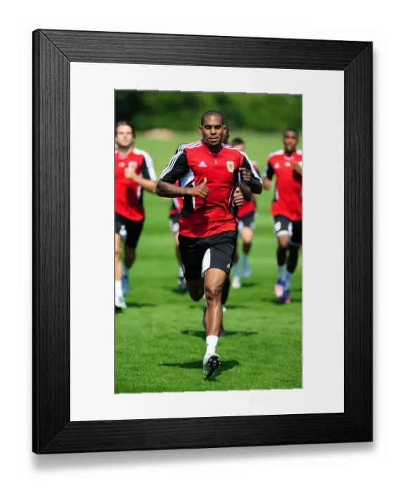 Framed Print : Albert Adomah's Unwavering Focus: Pre-season Training with Bristol City