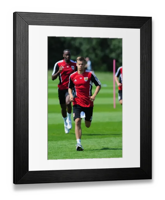 Framed Print : Henry Muggeridge: A Focused Figure in Bristol City's Pre-season Training Framed Print : Henry Muggeridge: A Focused Figure in Bristol City's Pre-season Training
