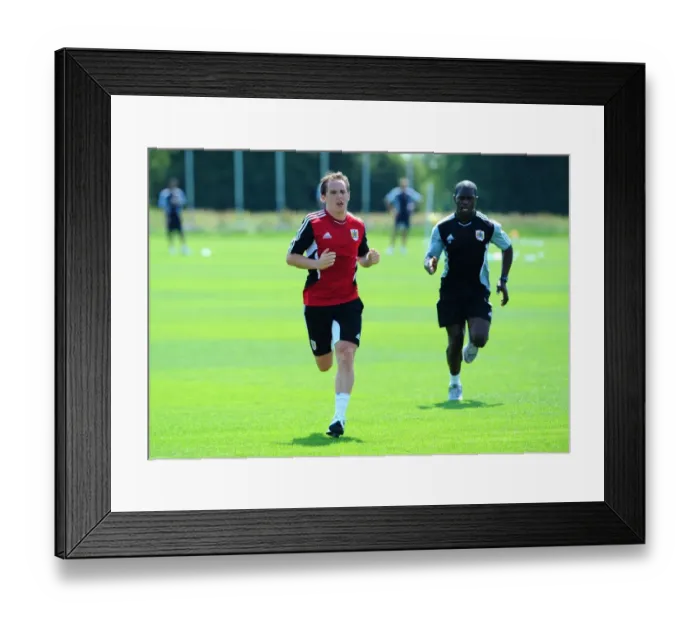 Framed Print : Neil Kilkenny's Unwavering Focus: Braving the Elements in Bristol City's Pre-season Training Framed Print : Neil Kilkenny's Unwavering Focus: Braving the Elements in Bristol City's Pre-season Training