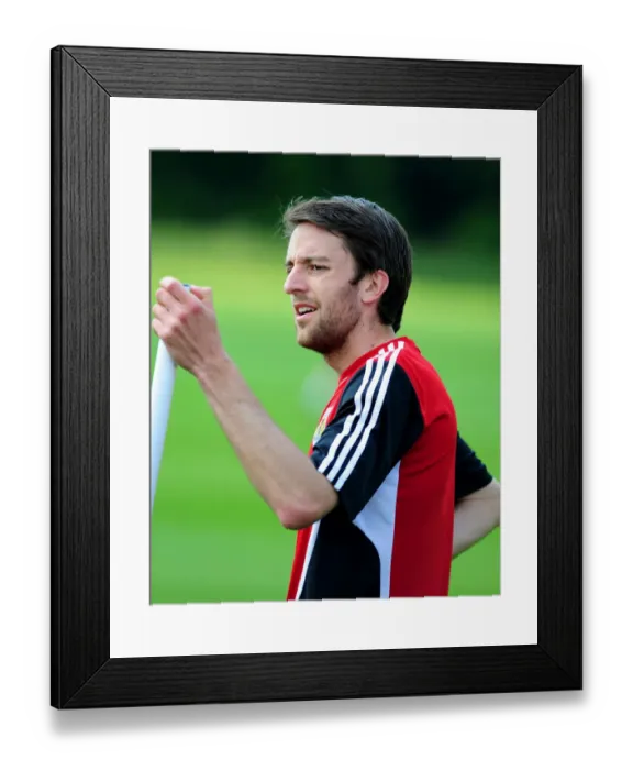 Framed Print : Bristol City's Cole Skuse: Unwavering Concentration during Pre-season Training Framed Print : Bristol City's Cole Skuse: Unwavering Concentration during Pre-season Training
