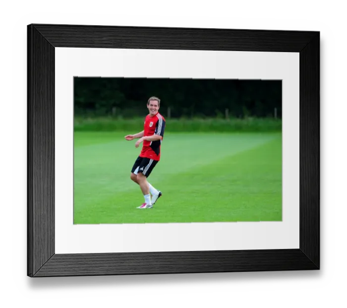 Framed Print : Neil Kilkenny: Bristol City's Focused Player Gears Up for Pre-Season Training Framed Print : Neil Kilkenny: Bristol City's Focused Player Gears Up for Pre-Season Training