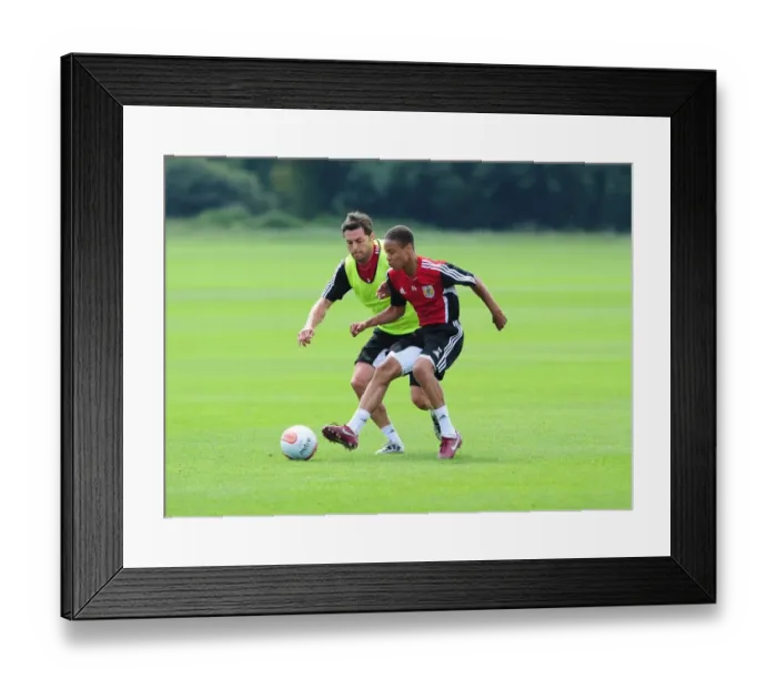 Framed Print : Bristol City: McAllister vs. Reid - A Battle for the Ball during Pre-season Training Framed Print : Bristol City: McAllister vs. Reid - A Battle for the Ball during Pre-season Training
