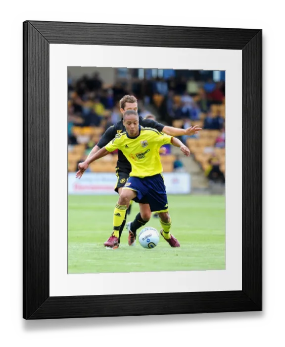 Framed Print : Bobby Reid Fights for Possession: Torquay vs. Bristol City