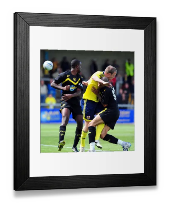 Framed Print : Bristol Citys David Clarkson crashed into the Torquay defence Framed Print : Bristol Citys David Clarkson crashed into the Torquay defence
