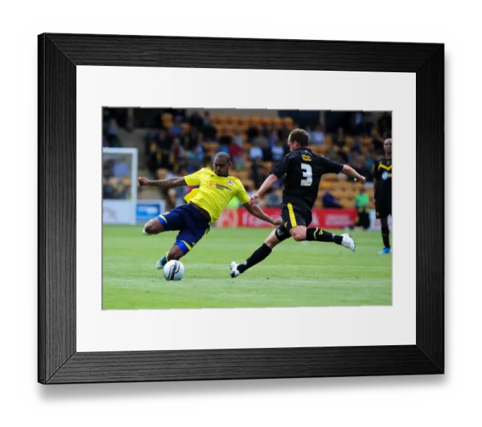 Framed Print : Bristol Citys Marvin Elliott throws himself into a challenge