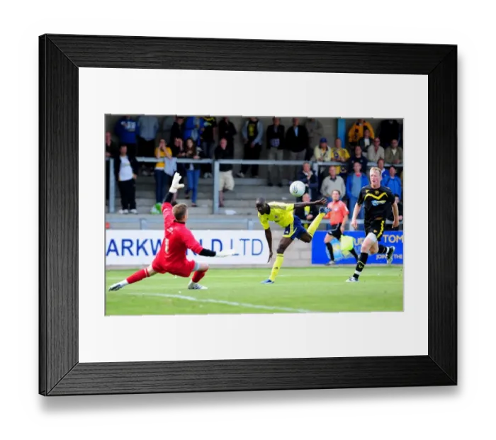 Framed Print : Bristol Citys Albert Adomah lifts the ball over the keeper but his effort is cleared off the line
