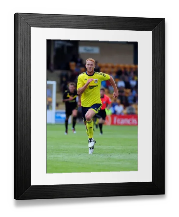 Framed Print : Ryan Taylor in Action: Torquay vs. Bristol City Football Match Framed Print : Ryan Taylor in Action: Torquay vs. Bristol City Football Match
