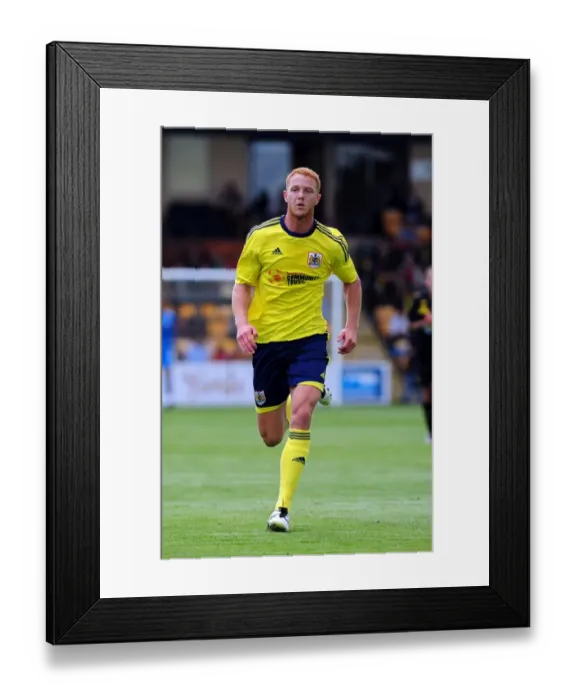 Framed Print : Ryan Taylor in Action: Torquay vs. Bristol City Football Match Framed Print : Ryan Taylor in Action: Torquay vs. Bristol City Football Match