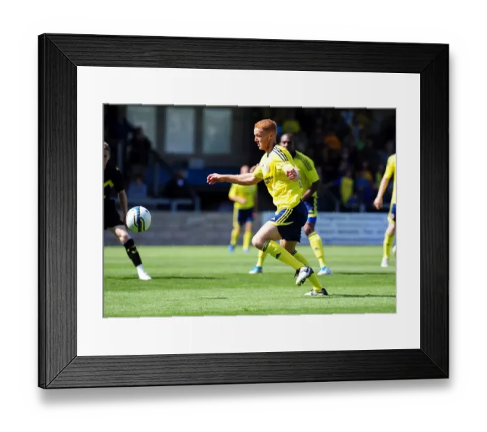 Framed Print : Bristol Citys Ryan Taylor fires over