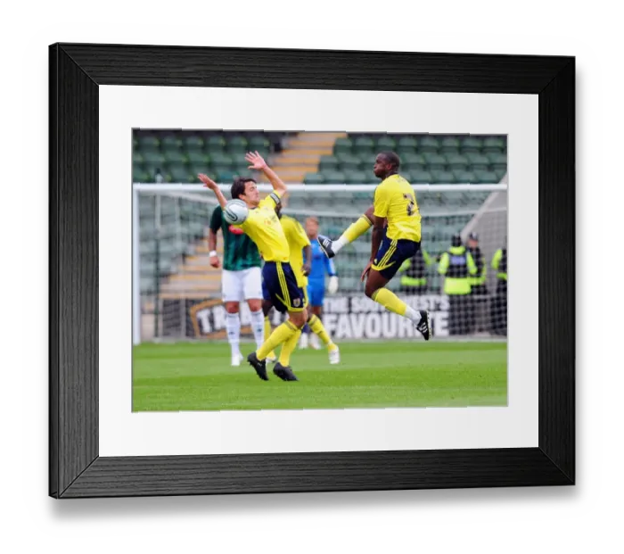 Framed Print : Bristol Citys Kalifa Cisse wins the high ball Framed Print : Bristol Citys Kalifa Cisse wins the high ball