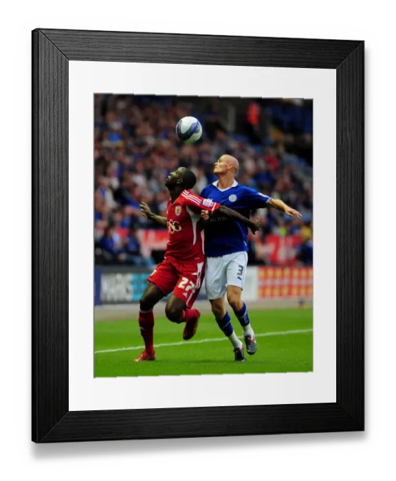 Framed Print : Adomah vs. Konchesky: Intense Battle for the Ball in Leicester City vs. Bristol City Championship Clash (August 2011) Framed Print : Adomah vs. Konchesky: Intense Battle for the Ball in Leicester City vs. Bristol City Championship Clash (August 2011)