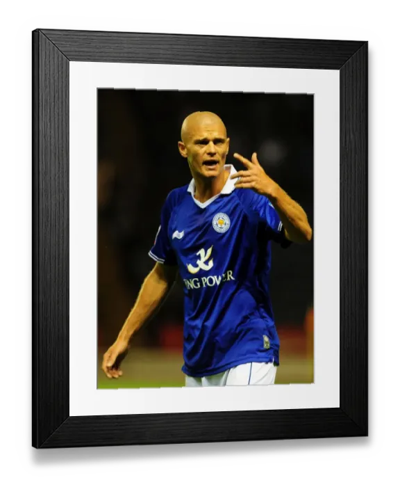 Framed Print : Championship Match: Paul Konchesky of Leicester City Argues with Referee Assistant during Leicester City vs. Bristol City (06 / 08 / 2011)