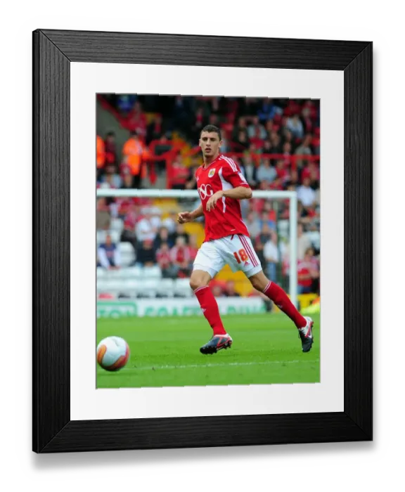 Framed Print : Bristol City vs Portsmouth (2011): James Wilson's Championship Action at Ashton Gate Stadium