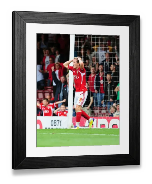 Framed Print : Disallowed Goal: Neil Kilkenny's Frustration at Ashton Gate as Bristol City vs. Portsmouth Championship Match Goal is Disallowed (2008-11)