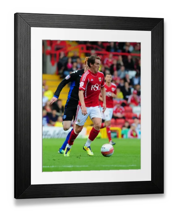 Framed Print : Neil Kilkenny in Action: Bristol City vs. Portsmouth, Championship Clash at Ashton Gate Stadium (2011)