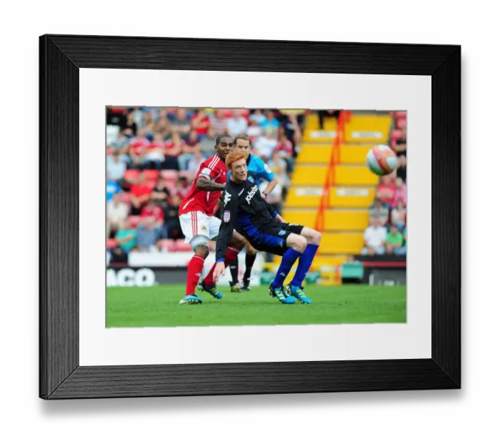 Framed Print : Intense Championship Rivalry: Marvin Elliott vs Dave Kitson - A Football Battle for Supremacy at Ashton Gate Stadium (Bristol City vs Portsmouth, 2011) Framed Print : Intense Championship Rivalry: Marvin Elliott vs Dave Kitson - A Football Battle for Supremacy at Ashton Gate Stadium (Bristol City vs Portsmouth, 2011)