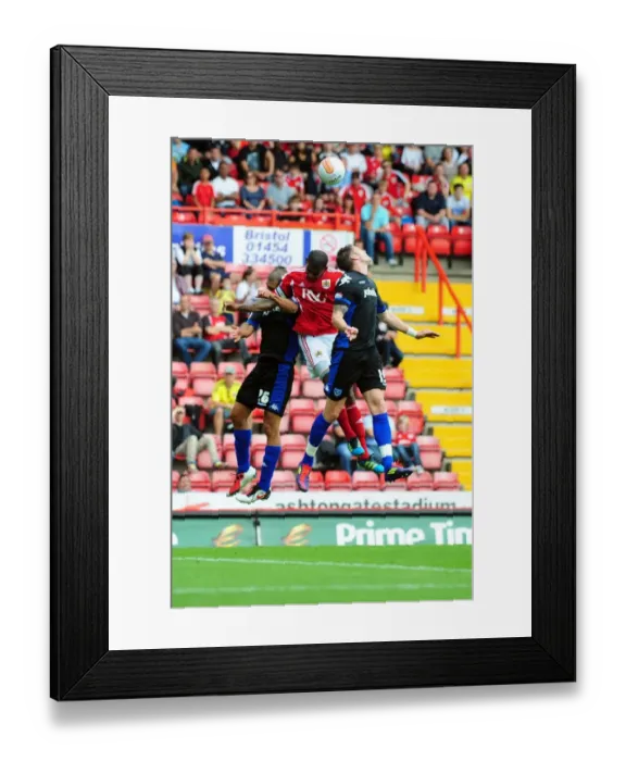 Framed Print : Marvin Elliott in Action: Bristol City vs Portsmouth, Championship Match at Ashton Gate Stadium (2008-2011)