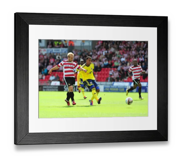 Framed Print : Nicky Maynard's Early Effort Goes Wide in Doncaster Rovers vs. Bristol City League Cup Clash (August 27, 2011)