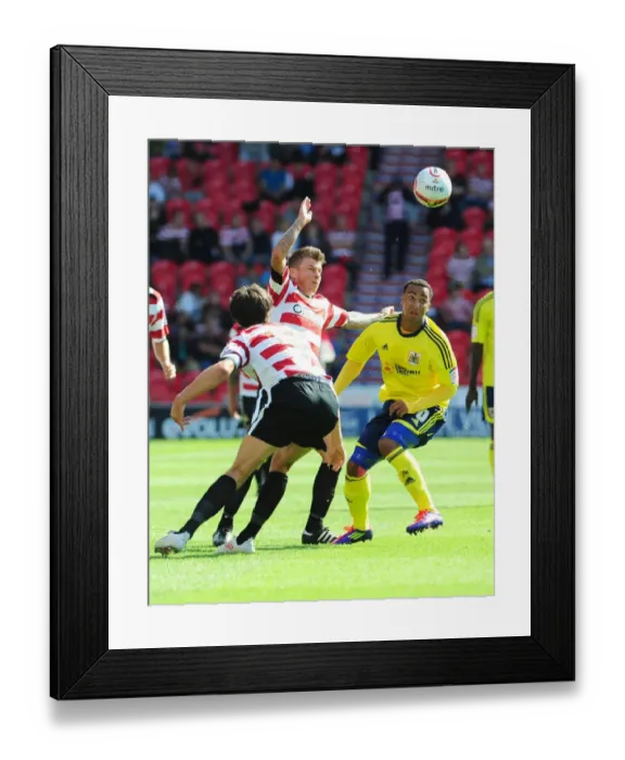 Framed Print : Battling for Supremacy: Maynard vs. Oster in Doncaster Rovers vs. Bristol City (League Cup, 2011)