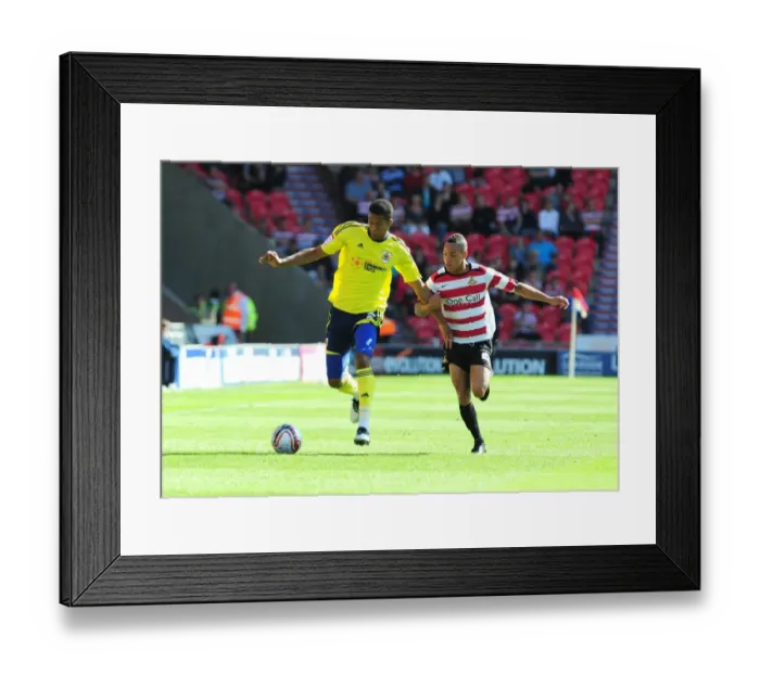 Framed Print : Bristol City's Jordan Spence vs. Kyle Bennett in League Cup Clash at Doncaster Rovers - 27 / 08 / 2011
