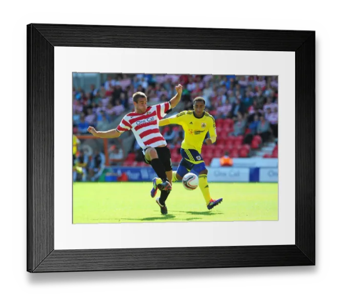 Framed Print : Doncaster's Spurr Clears Under Pressure from Maynard in Doncaster Rovers vs. Bristol City (League Cup, 2011) Framed Print : Doncaster's Spurr Clears Under Pressure from Maynard in Doncaster Rovers vs. Bristol City (League Cup, 2011)