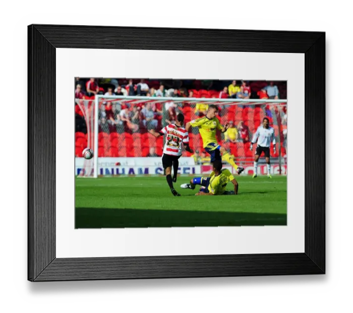 Framed Print : Bristol City's Wilson and Spence Clash with Doncaster's Bennett in League Cup Match, 2011 Framed Print : Bristol City's Wilson and Spence Clash with Doncaster's Bennett in League Cup Match, 2011
