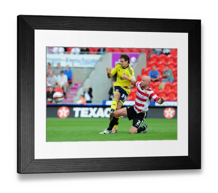 Framed Print : Doncaster Rovers James O'Connor Tackles Brett Pitman of Bristol City - League Cup Clash, 2011 Framed Print : Doncaster Rovers James O'Connor Tackles Brett Pitman of Bristol City - League Cup Clash, 2011