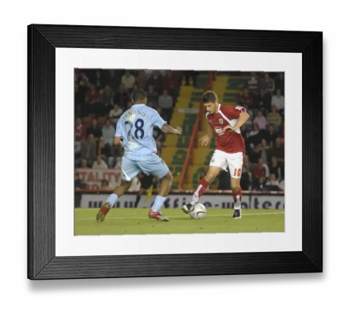 Framed Print : Phil Jevons: A Star in Two Cities - Bristol City vs Manchester City Framed Print : Phil Jevons: A Star in Two Cities - Bristol City vs Manchester City