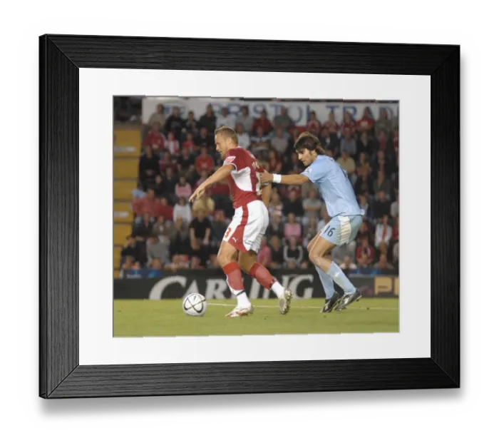 Framed Print : Lee Trundle's Epic Battle Against Manchester City (Bristol City vs Manchester City)