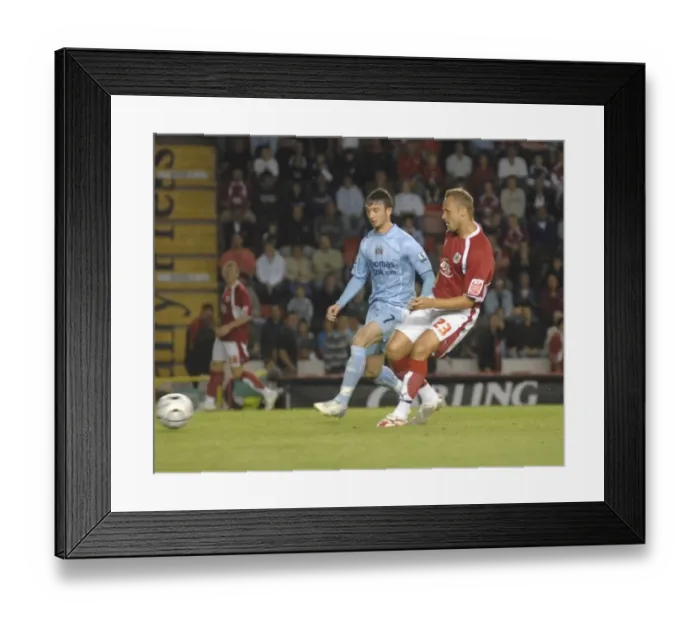 Framed Print : Bristol Rivalry: Lee Trundle vs Manchester City Framed Print : Bristol Rivalry: Lee Trundle vs Manchester City