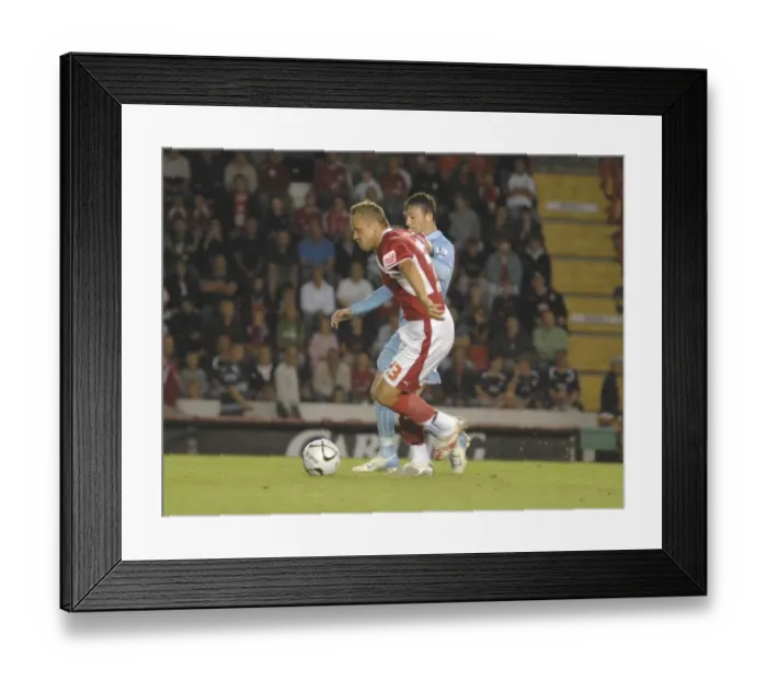 Framed Print : Bristol City vs Manchester City Rivalry: Lee Trundle's Clash of Football Titans