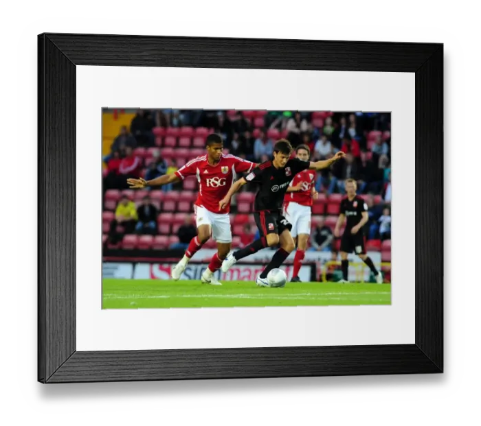 Framed Print : Bristol City vs Swindon Town: Jordan Spence vs Lander Gabilondo Battle in League Cup Match, August 2011